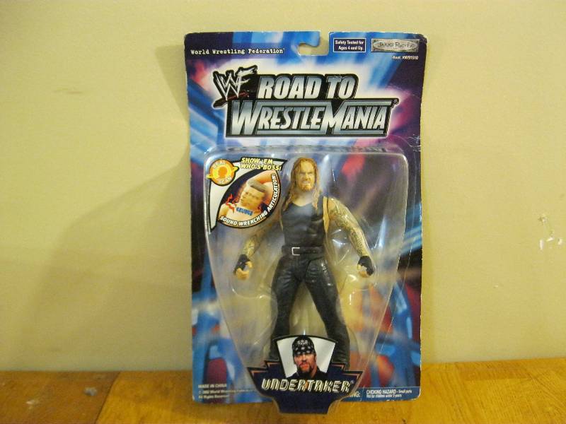 lot 32 image: WWE Figure - Undertaker, In Package