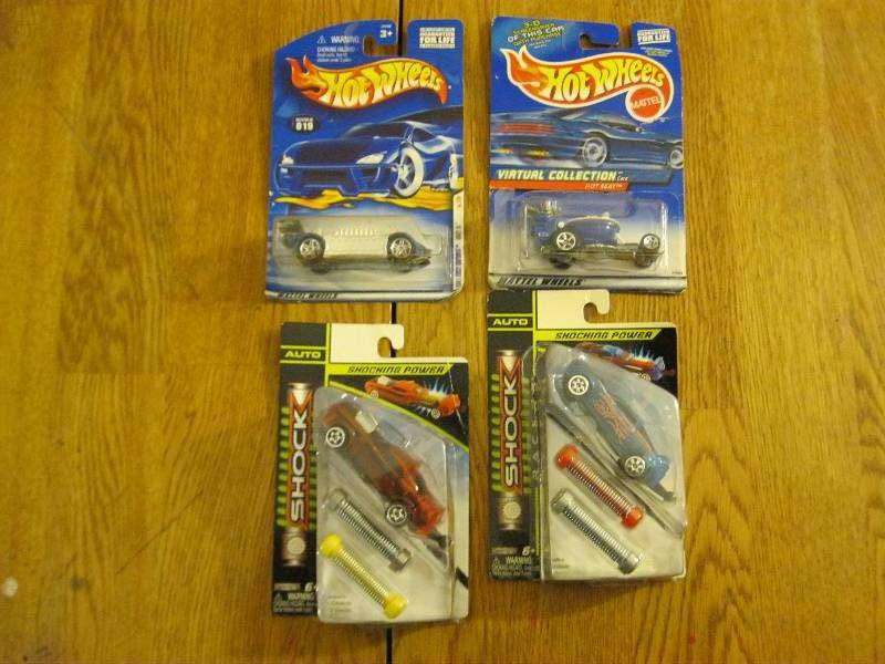 lot 40 image: Lot Of Hotwheels And Shock Cars