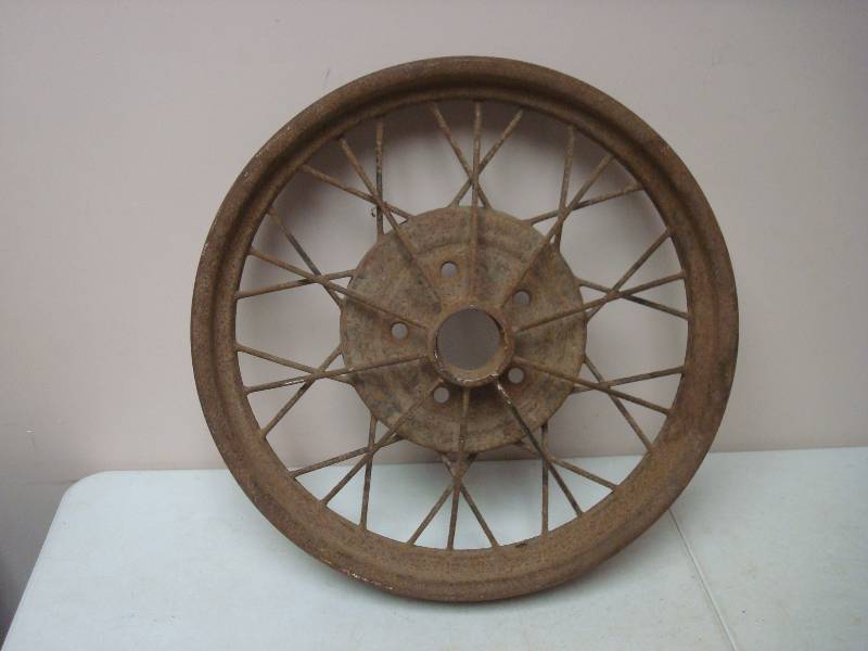 lot 51 image: Antique Model T Metal Spoke Wheel, Has Wear