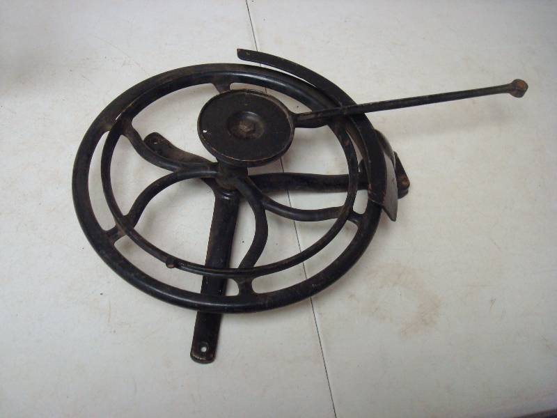 lot 54 image: Cast Metal Wheel Part Of Something