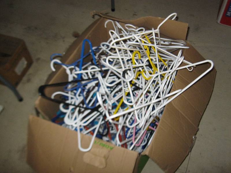 lot 131 image: Box Of Plastic Hangers