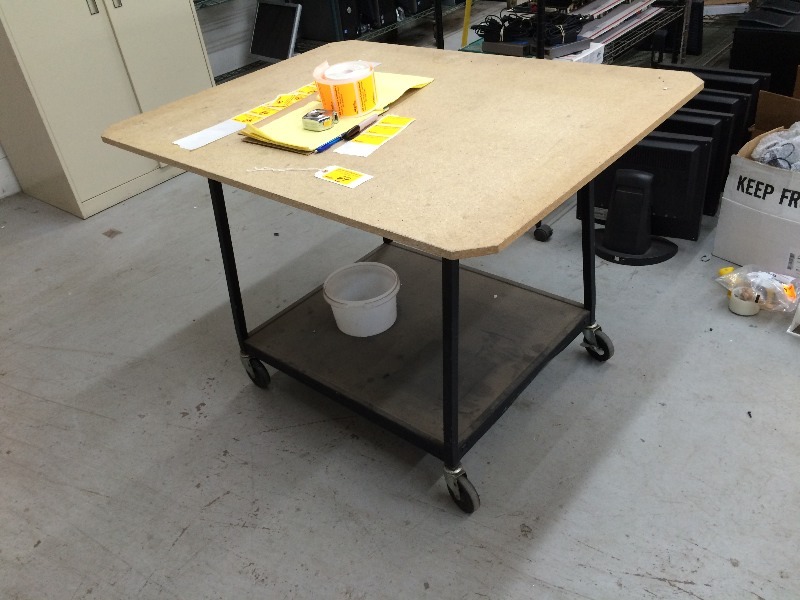 Table on wheels  Measures 48 x 36 x 32 tall
