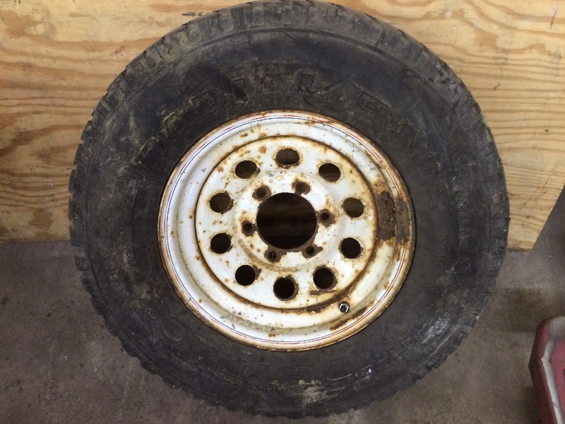 (2) 4 x 8 plywoodpaneling (1) Widetrak Tire LT23575R15M