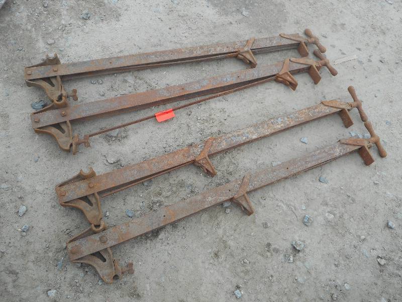 lot 12 image: (4) Antique Bar Clamps