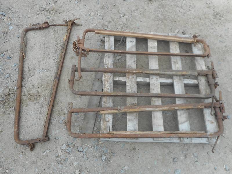 lot 17 image: (4) Antique Cattle Clamps