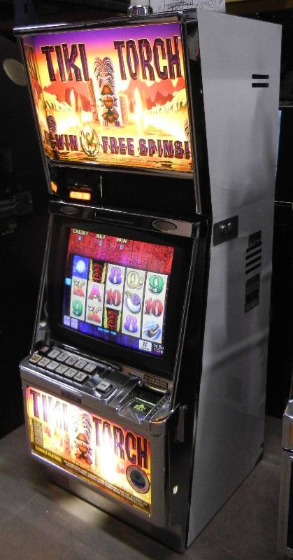 lot 1002 image: ARISTOCRAT MAV500 TIKI TORCH VIDEO SLOT MACHINE