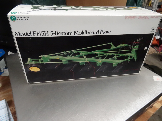 lot 63 image: John Deere F145H Plow