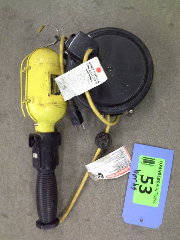 Trouble light with electrical wire spool
