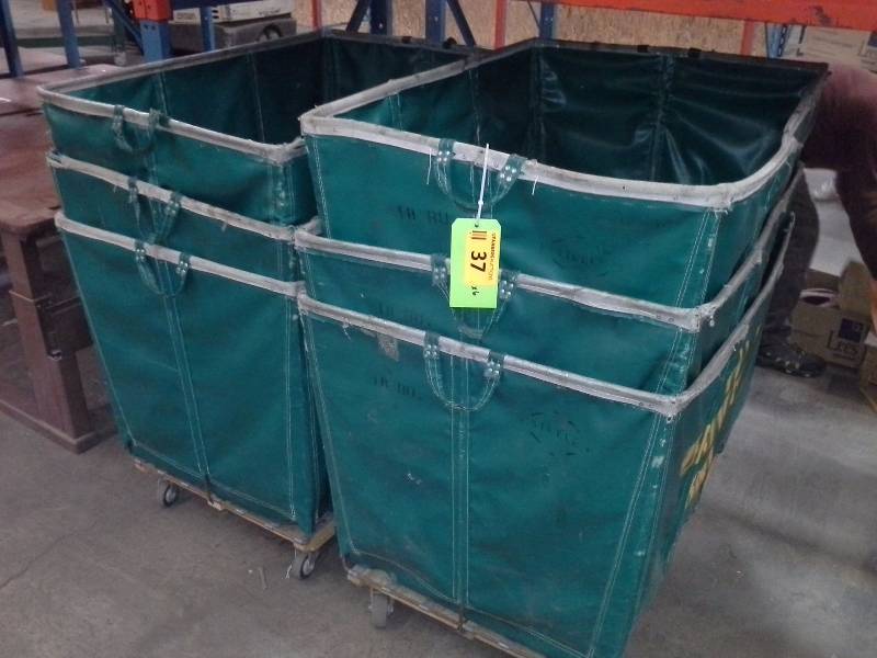 6 green shipping and receiving bins