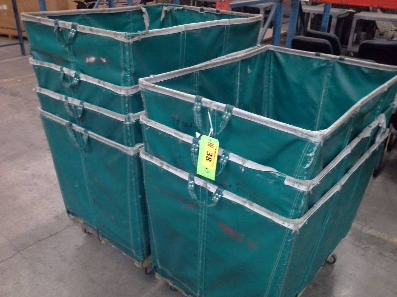 7 green shipping and receiving bins