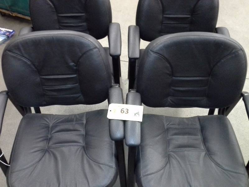 Lot of 4 office chairs, not real leather.