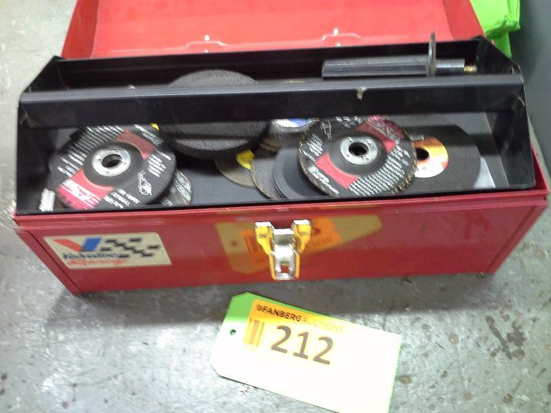 Red toolbox with miscellaneous grinding wheels
