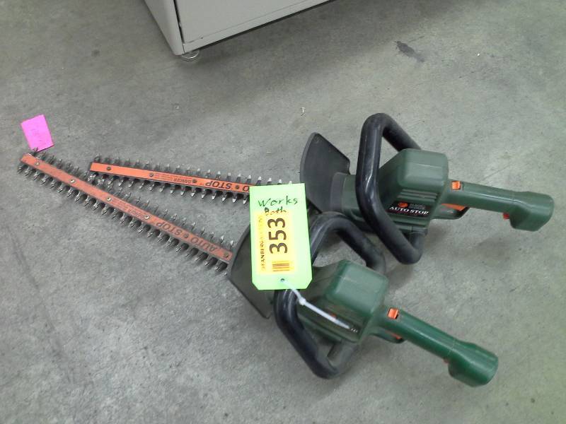 Pair of Black & Decker hedge trimmers.