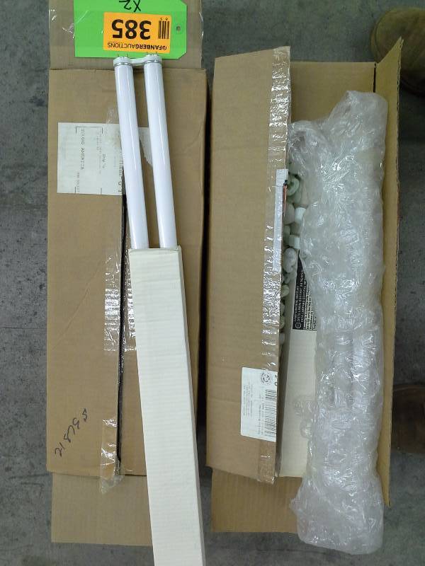 2 boxes of fluorescent light bulbs