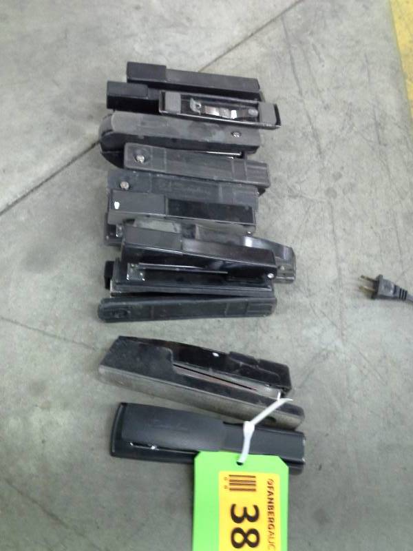 Lots of 12 staplers and counterweights