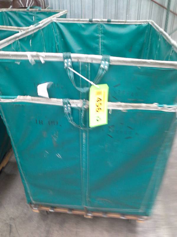 Lots of 2 green shipping and receiving bins