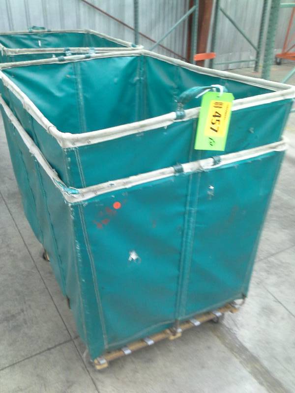 Lots of 2 green shipping and receiving bins