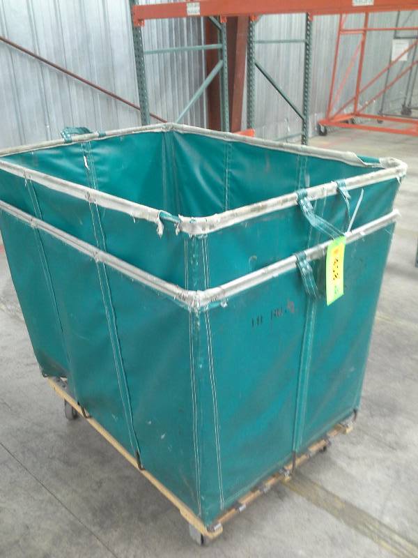 Lots of 2 green shipping and receiving bins