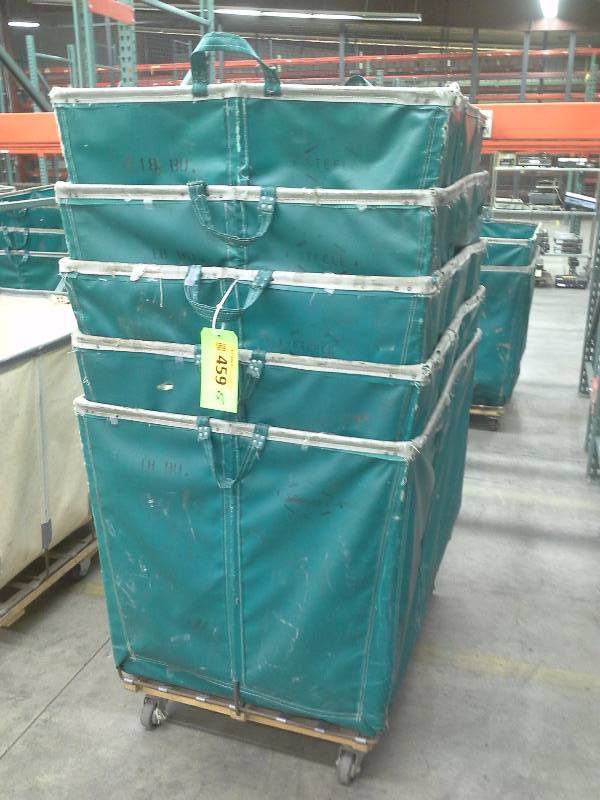 Lots of 5 green shipping and receiving bins