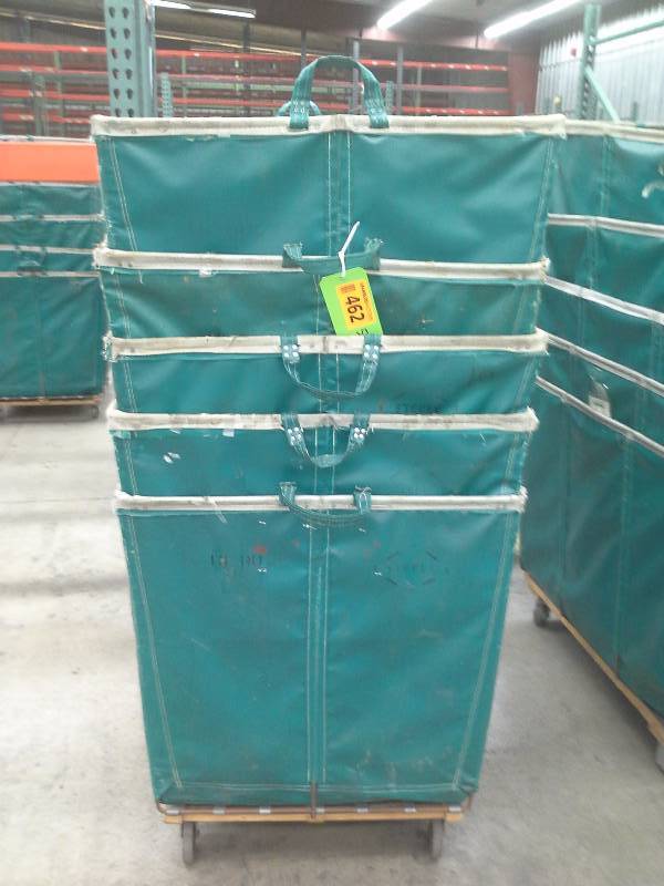 Lots of 5 green shipping and receiving bins