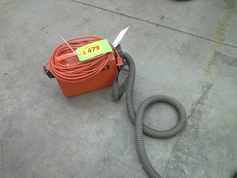 Small mobile vacuum cleaner, shoulder carried