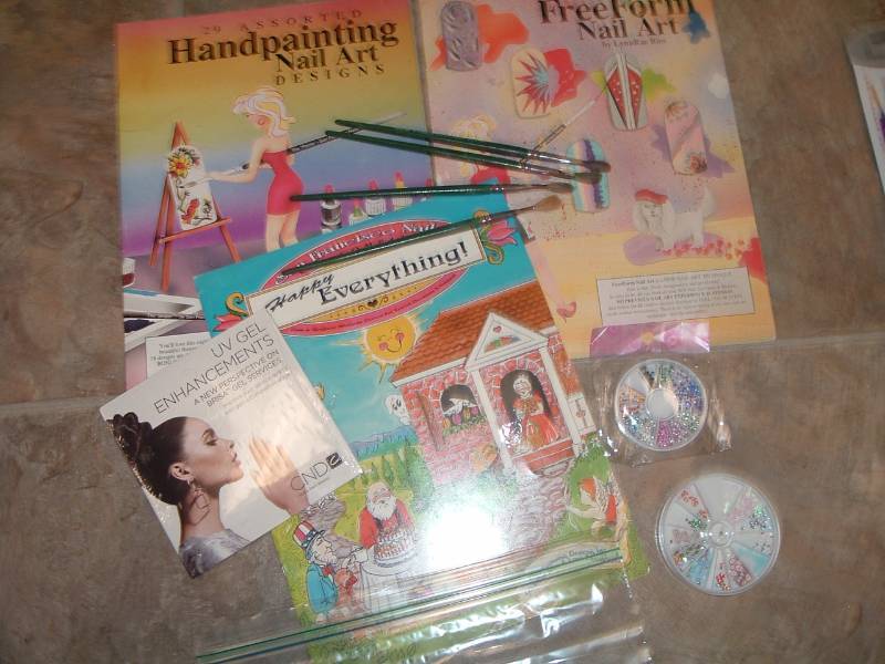 lot 285 image: Nail Design books, gems,and brushes