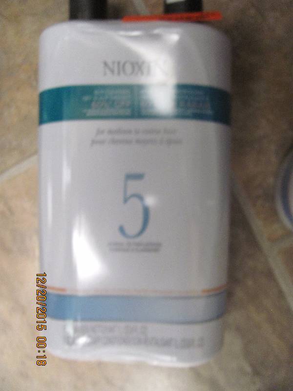 lot 151 image: Nioxin Duo