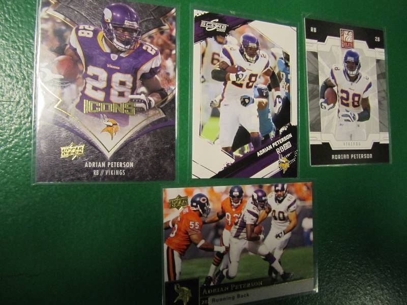 4 Adrian Peterson cards...