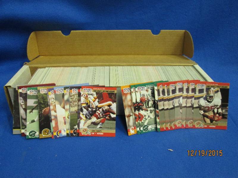 Box of 1990 Proset football cards...