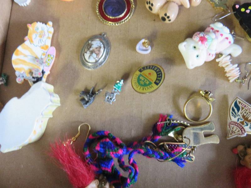 lot 100 image: pins etc.