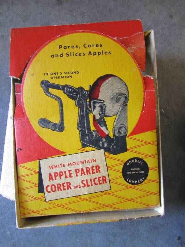 parers, cores and slices apples whi...