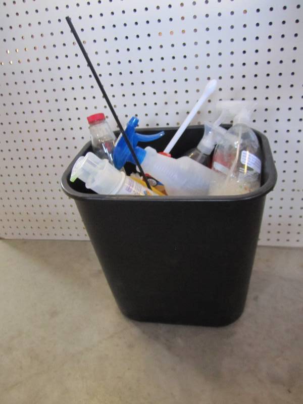 bin of cleaning supplies, some part...