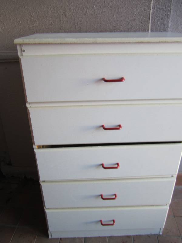 white dresser with red handles 48...