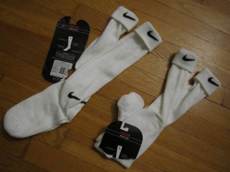 2 Brand New Pairs of Nike brand spo...