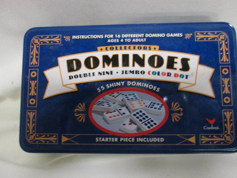 Dominoes game in metal tin...