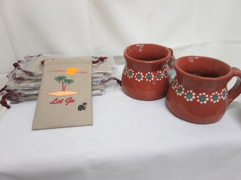 lot 104 image: Lot of 7 tan drawstring palm tree t...