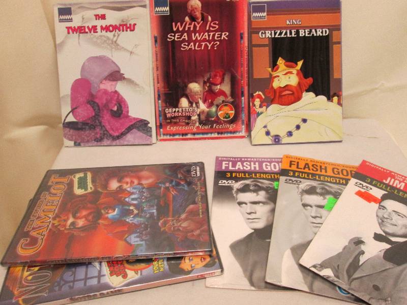 lot 155 image: Lot of 8  assorted unopened DVDs...