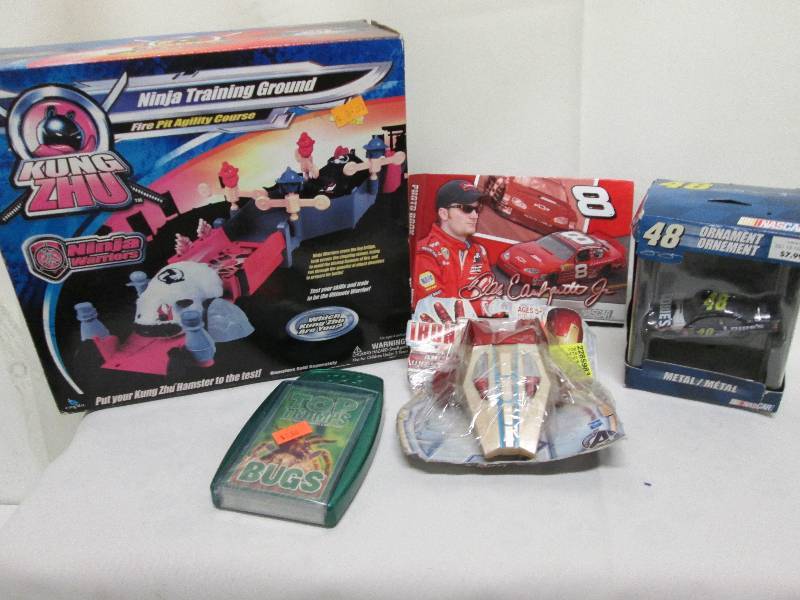 lot 261 image: Ninja warrior toy, NASCAR photo boo...