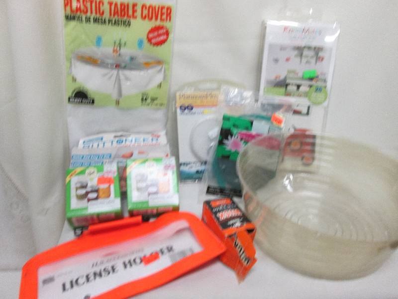 lot 277 image: License holder, plastic table cloth...