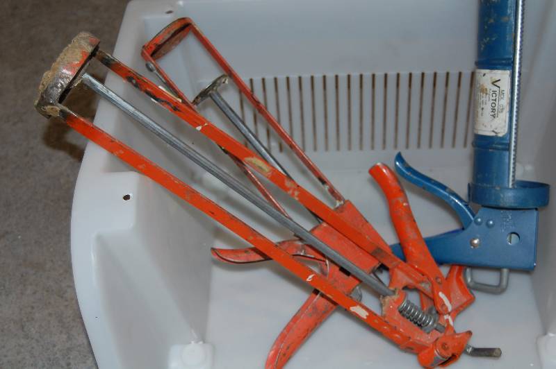 lot 22 image: Tub of Caulking Guns