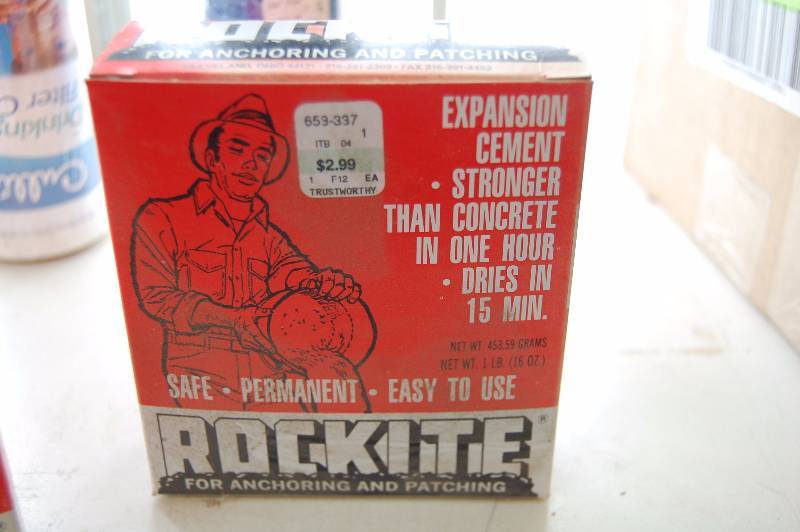 lot 84 image: Expansion Cement, Water filters,  and splash guard.