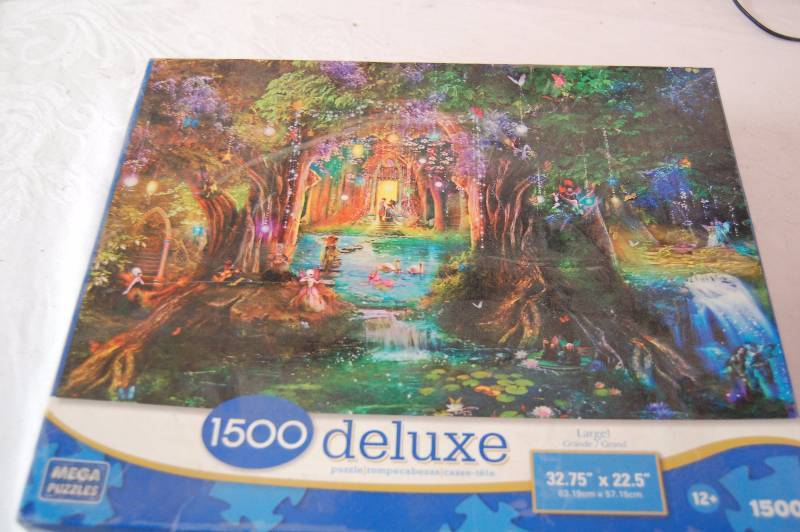 lot 241 image: Battery Chargers and a Puzzle.
