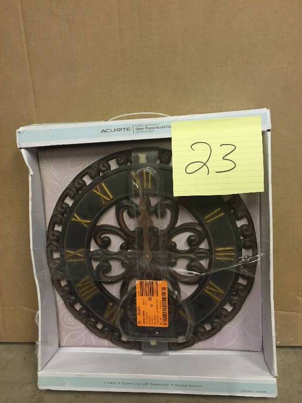 lot 23 image: Open Frame Scroll Clock New