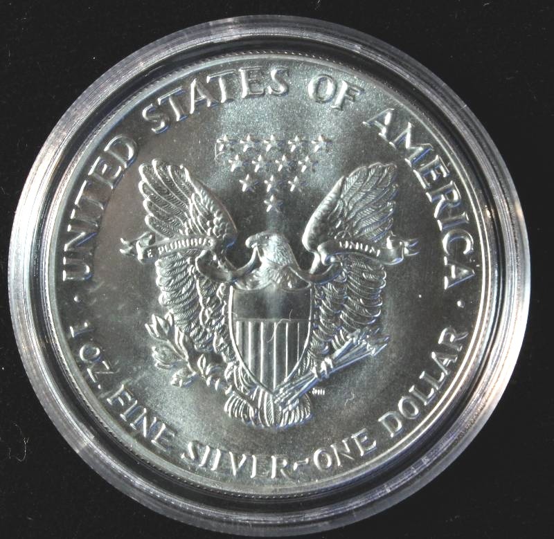 1987 AMERICAN SILVER EAGLE 1 TROY OZ. .999 FINE SILVER DOLLAR IN AIRTITE CAPSULE