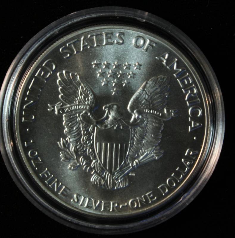 1986 AMERICAN SILVER EAGLE 1 TROY OZ. .999 FINE SILVER DOLLAR IN AIRTITE CAPSULE