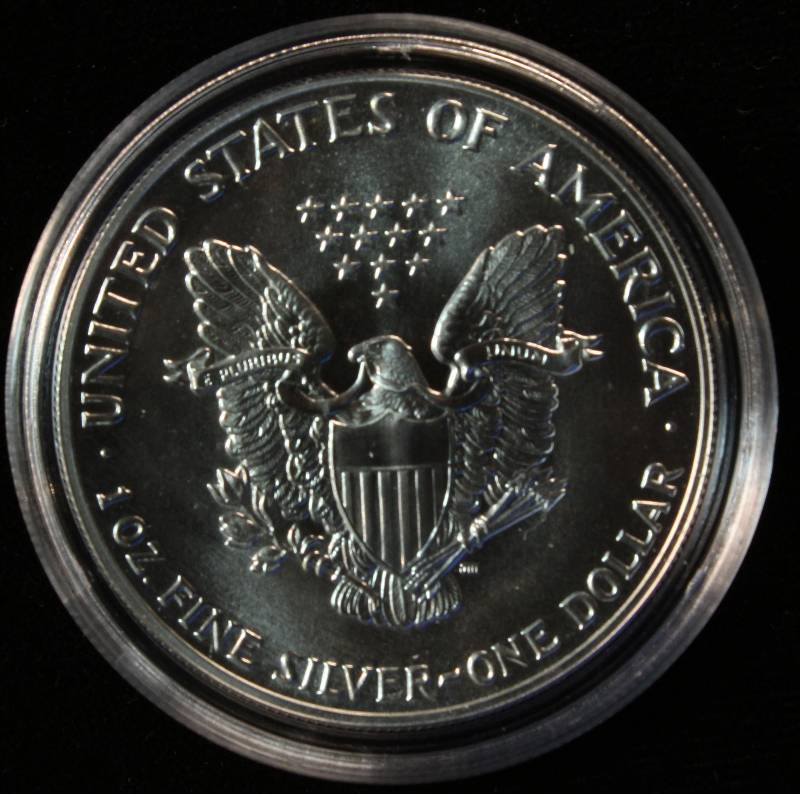 1987 AMERICAN SILVER EAGLE 1 TROY OZ. .999 FINE SILVER DOLLAR IN AIRTITE CAPSULE