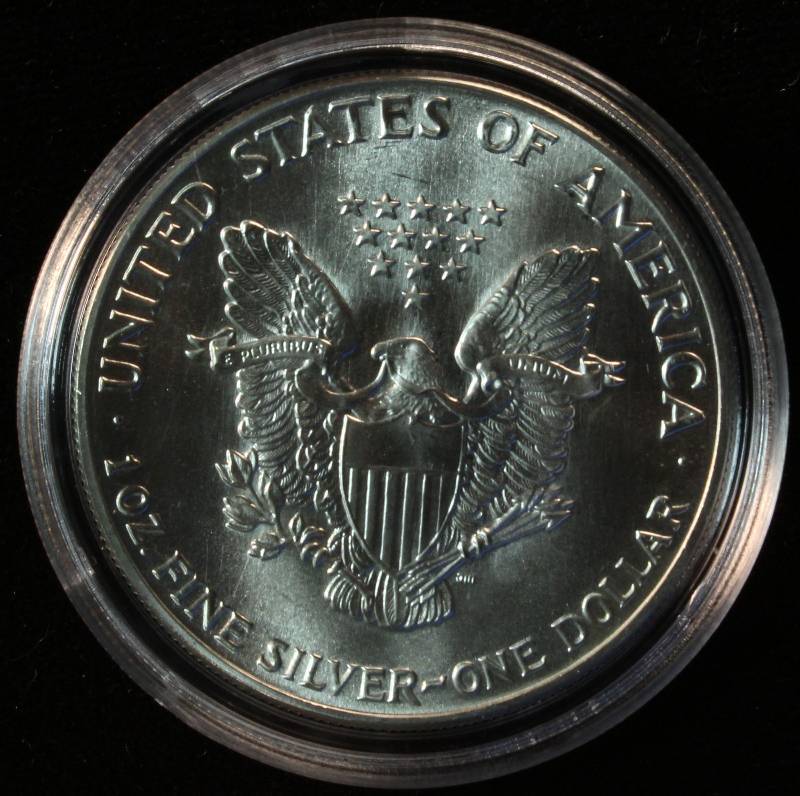 1986 AMERICAN SILVER EAGLE 1 TROY OZ. .999 FINE SILVER DOLLAR IN AIRTITE CAPSULE