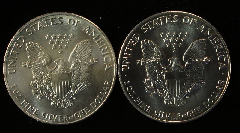 LOT OF 2 1987 AMERICAN SILVER EAGLE DOLLAR COINS 1 TROY OZ. FINE SILVER EACH