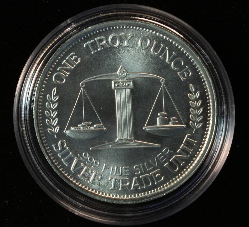 1 TROY OZ. .999 FINE SILVER ROUND 1985 MORGAN DOLLAR DESIGN IN CAPSULE