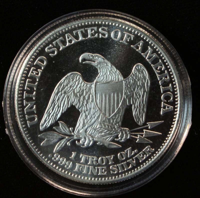 1 TROY OZ. .999 FINE SILVER SEATED LIBERTY DESIGN IN AIRTITE HOLDER